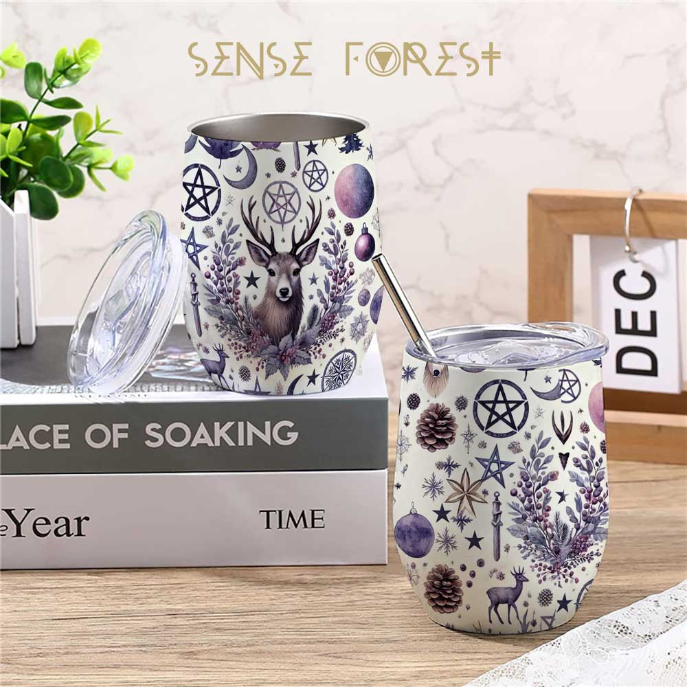 2 pagan deer moon pentagram printed 12 oz wine tumbler on a desk