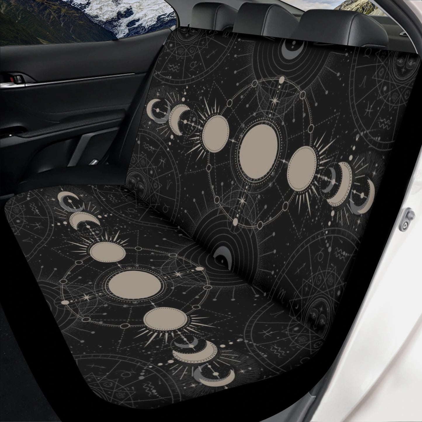 Black car seat cover set with mystical moon phases design and intricate celestial patterns, Sense Forest branding visible.