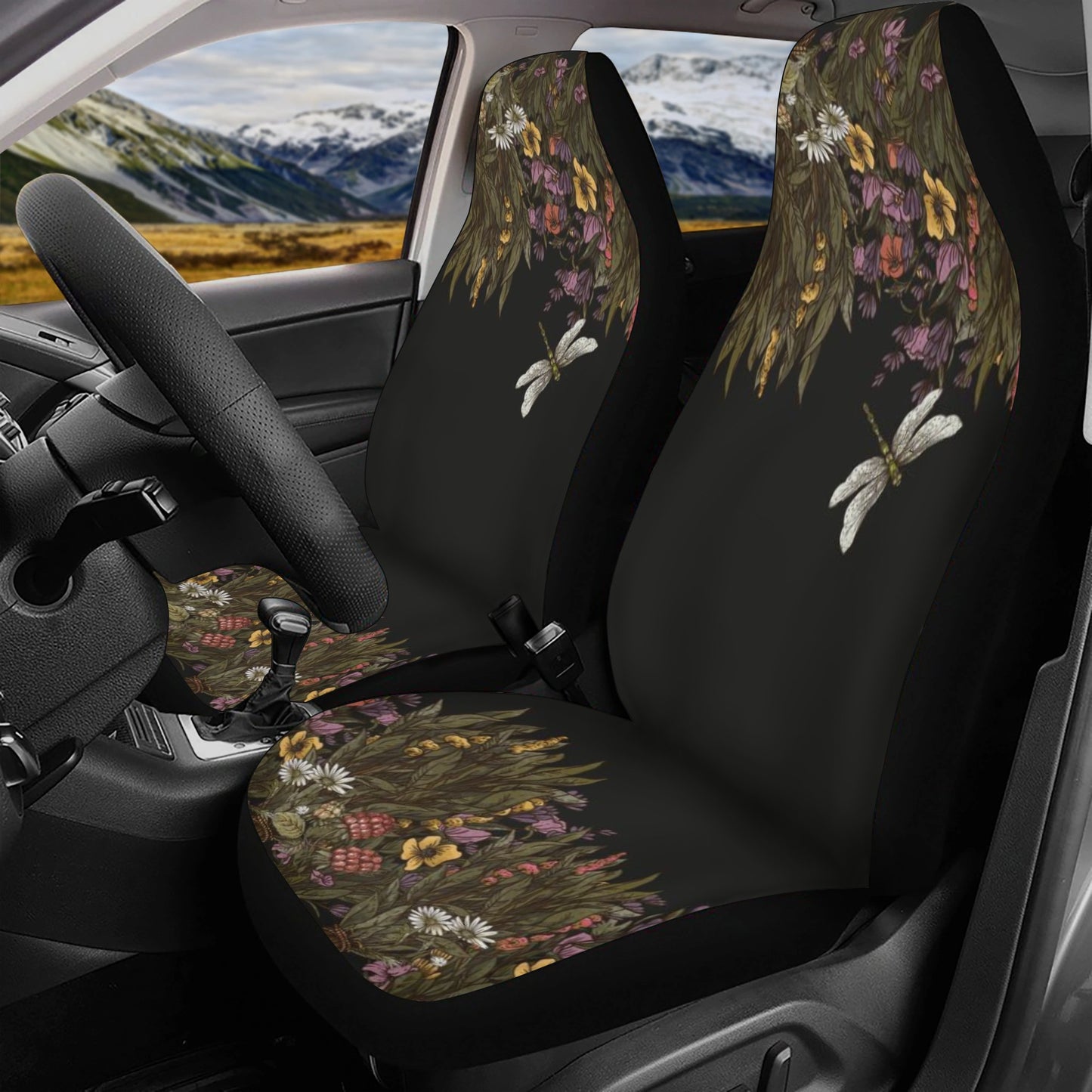 Black car seat covers with Sense Forest green witch dried flower design on front panels.