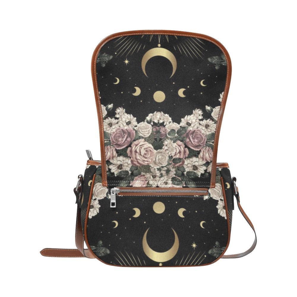 Sense Forest pale rose canvas saddle bag with moon phase and floral design, brown leather trim.