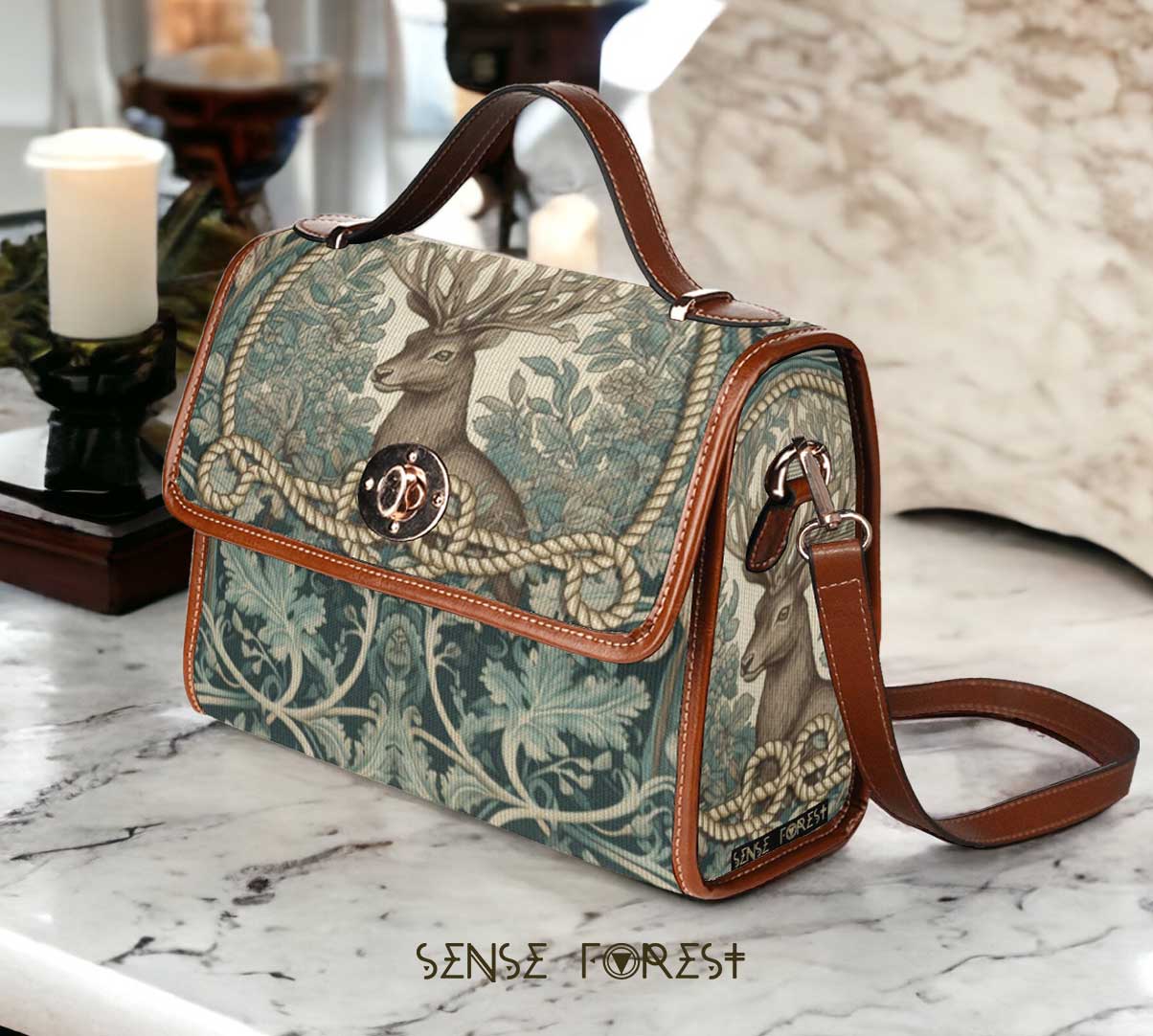 Mint forest deer satchel bag with intricate green foliage pattern and brown leather trim by Sense Forest.