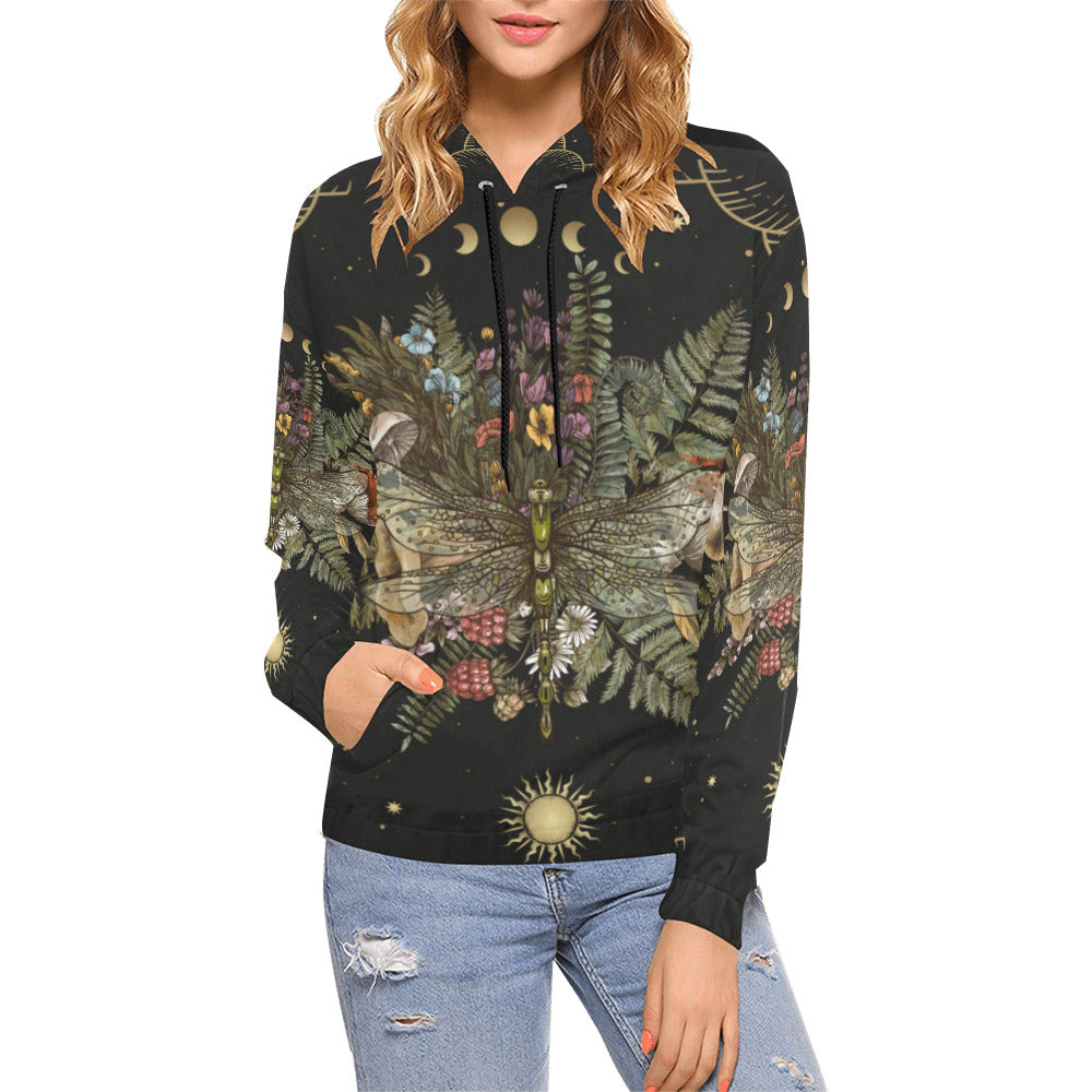 A blonde woman is wearing a witchy mushroom fern dragonfly polyester pull over hoodie