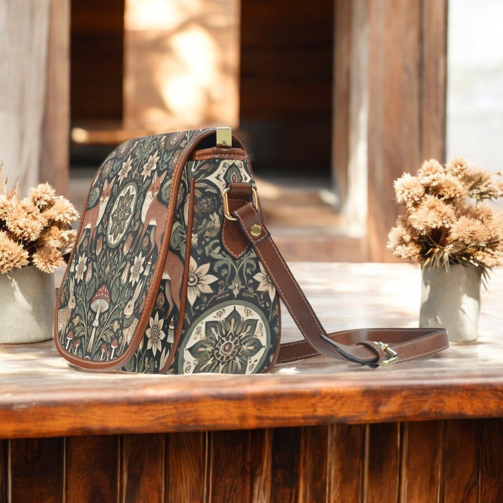side view of Retro canvas saddle bag with fox mushroom rabbit print in the style of forest witch cottagecore by sense forest