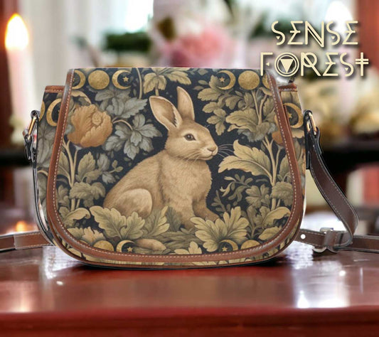 Retro botanical rabbit canvas saddle bag with leather trim by Sense Forest.