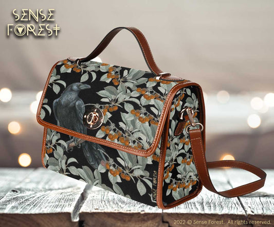 a boxy purse with Crow in the berry bush print on the Witchy Waterproof Canvas satchel Bag